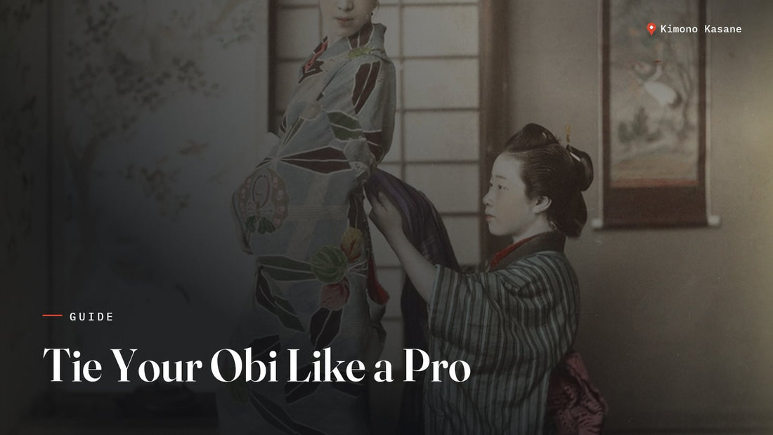 Woman learning how to tie an obi sash around her kimono waist
