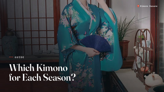 Woman wearing a turquoise floral kimono with a fan in a traditional Japanese interior, seasonal kimono guide
